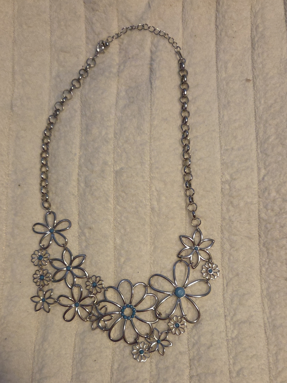 Silver Floral Necklace with Blue Accents - Elegant Statement Piece